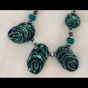 Bottle green clay bead necklace and bracelet.